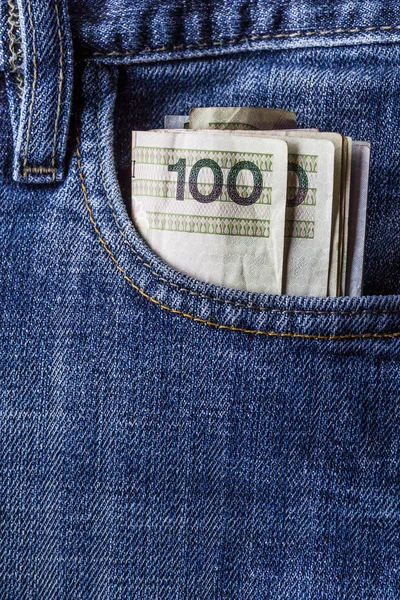 Several Polish banknotes jeans pocket — Stock Photo, Image