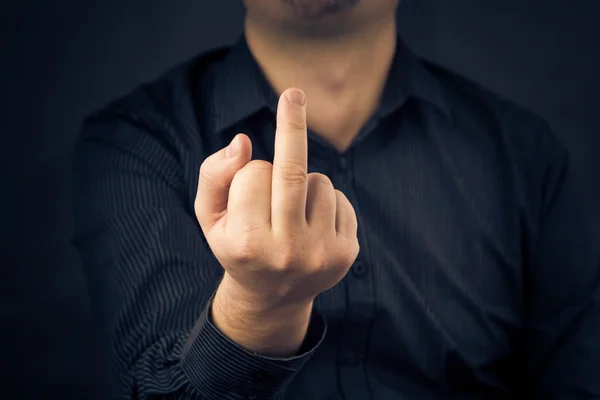 Man shirt showing fuck middle finger — Stock Photo, Image