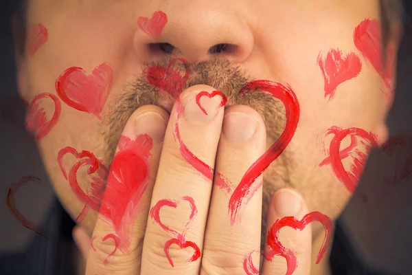 Man love giving away red hearts — Stock Photo, Image