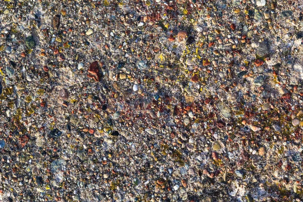 Background concrete wall colored stones — Stock fotografie