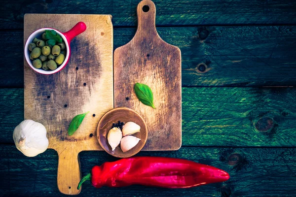 Old chopping boards spices herbs — Stock Photo, Image