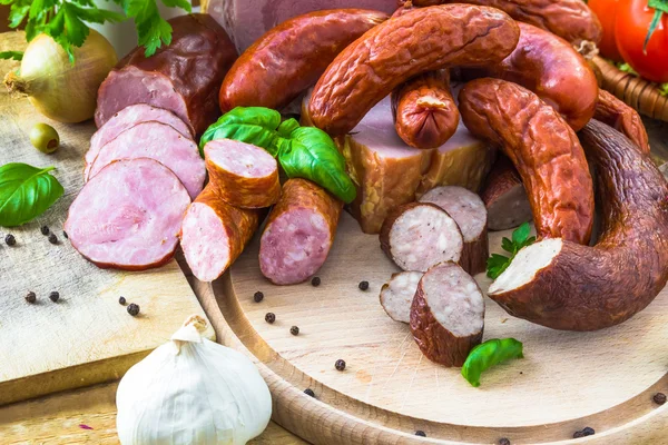 Variety processed meat products vegetables — Stock Photo, Image