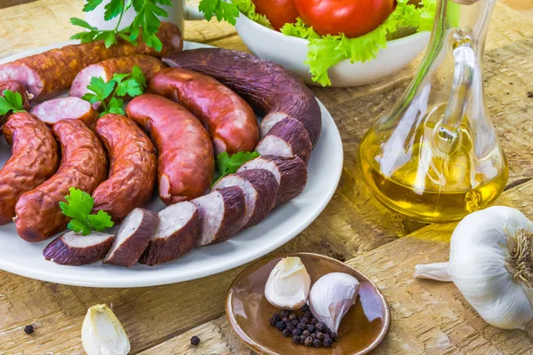 Country table plate sausage spices — Stock Photo, Image