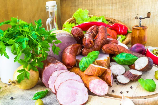 Variety processed meat products vegetables — Stock Photo, Image