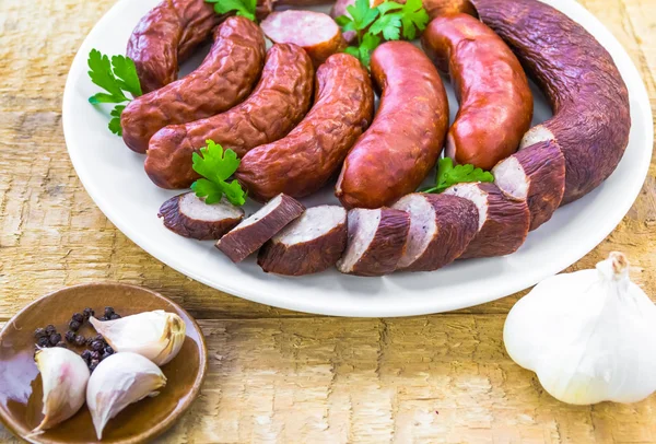 Plate full sausage spices herbs — Stock Photo, Image