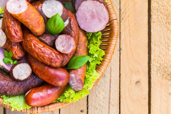 Background basket meat sausages meats — Stock Photo, Image