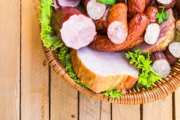 Background basket meat sausages meats — Stock Photo, Image