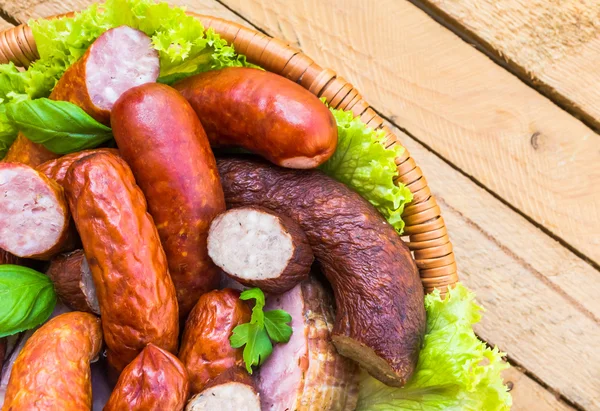 Background basket meat sausages meats — Stock Photo, Image