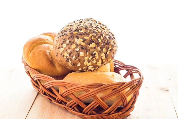 Wicker basket different types bread rolls — Stock Photo, Image