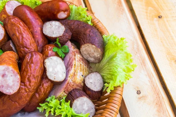 Background basket meat sausages meats — Stock Photo, Image