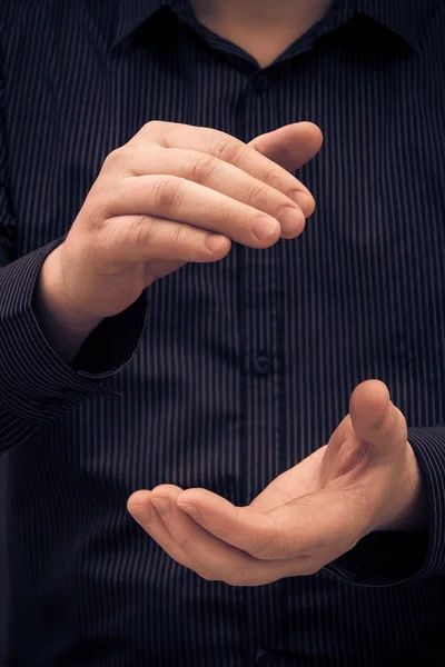 Man hand showing size applauding — Stock Photo, Image