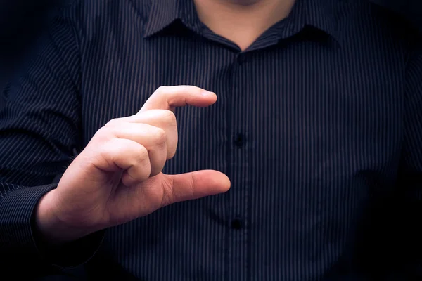 Man hand holding gadget showing size something — Stock Photo, Image