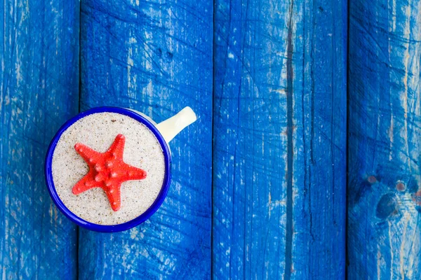 Kleurentabel cup blauwe mantel — Stockfoto