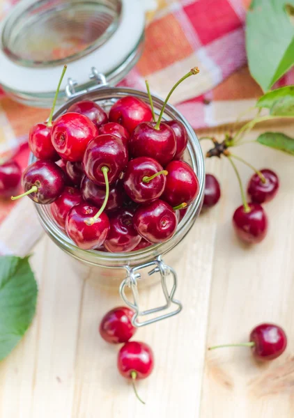 Summer fruits closeup cherries jar processed — Stock Photo, Image