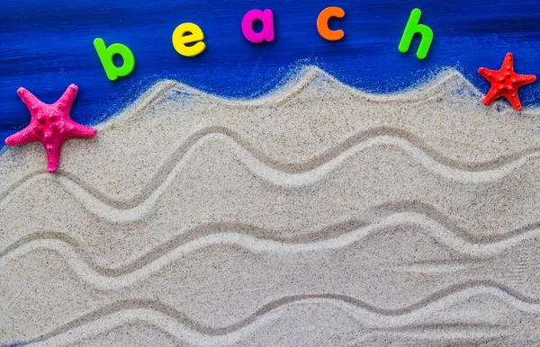 The word beach laid sand — Stock Photo, Image