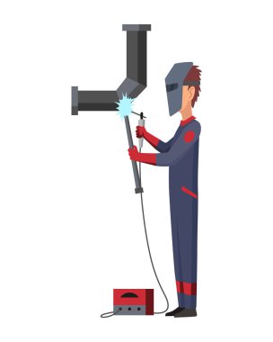 Kaynakçı işte. Adam tamir eder. İş elbiseli genç bir adam. Koruyucu maske ve eldiven giyen bir işçi. Kaynak ekipmanları