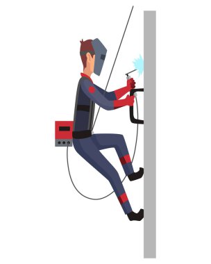 Kaynakçı işte. Adam tamir eder. İş elbiseli genç bir adam. Koruyucu maske ve eldiven giyen bir işçi. Kaynak ekipmanları.