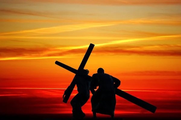 Dragging a wooden cross — Zdjęcie stockowe