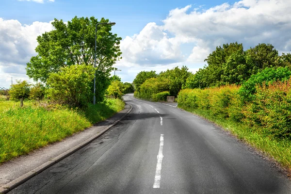 Bochtige bergweg — Stockfoto