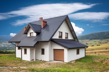 New family house in the mountains clipart