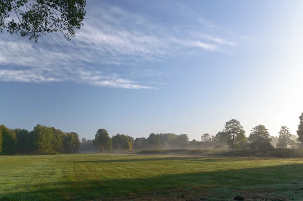 Zon achter de wolken — Stockfoto