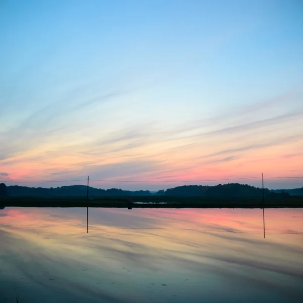 Sonne hinter den Wolken — Stockfoto