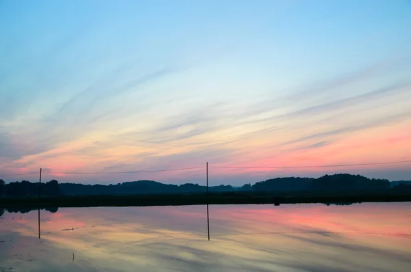 Sonne hinter den Wolken — Stockfoto