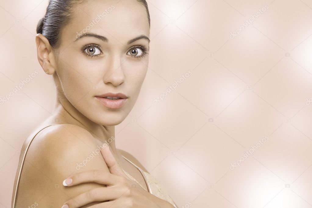 Portrait of young beautiful woman on color background