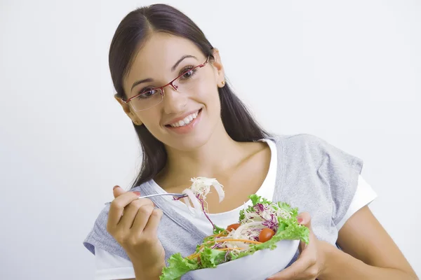 Portrait of young nice woman getting busy in gym — Stock Photo, Image