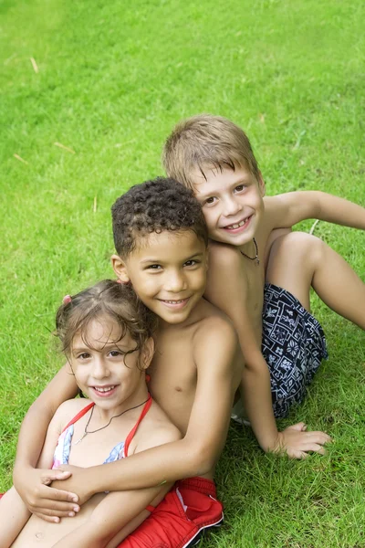 Portrait of little kids having good time in summer environment Stock Image