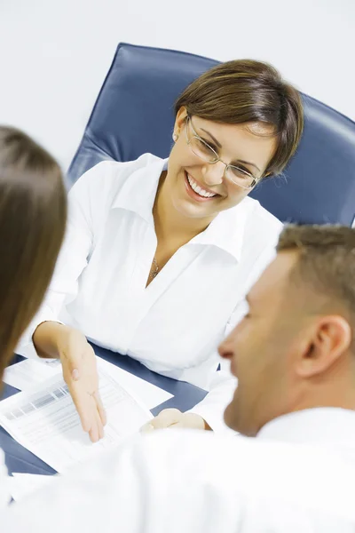 Portrait of young business discussing project in office environment — Stock Photo, Image