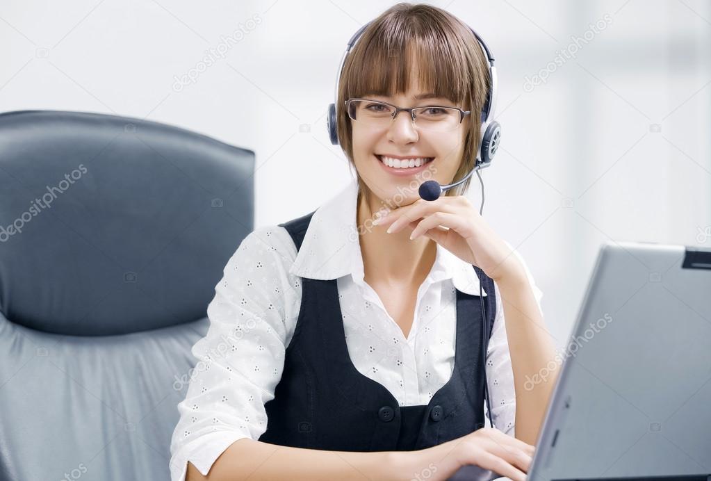 Portrait of young attractive woman in office environment