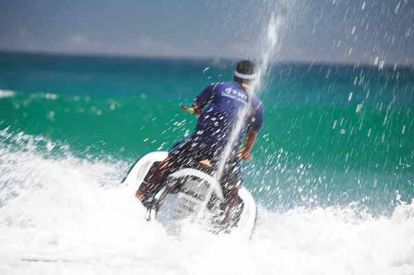 View of jetski rider fiercely struggling with ocean wave — Stock Photo, Image