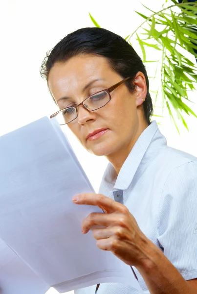 Portrait of businesswoman doing her paperwork in the office — Stock Photo, Image