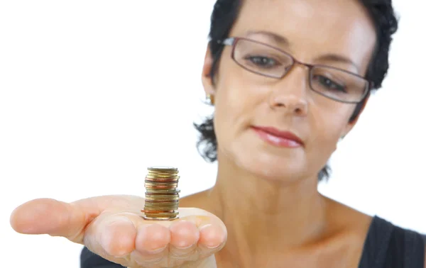 Portrait of a woman holding rouleau on her palm on white back — Stock Photo, Image