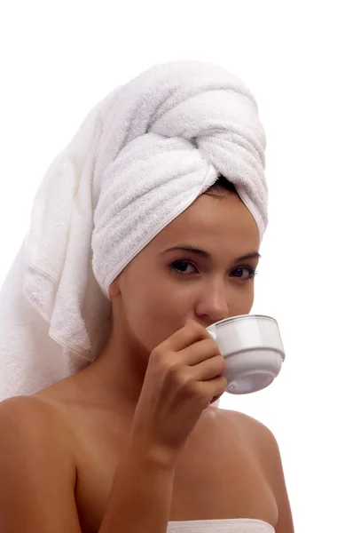 View of a woman on the sofa drinking some coffee — Stock Photo, Image