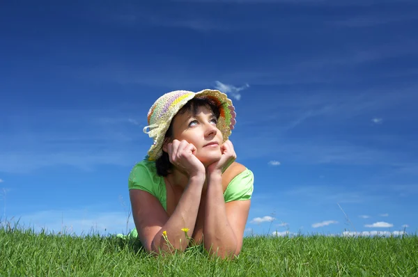 Portrait of nice cute woman with flowers in summer environment Royalty Free Stock Photos