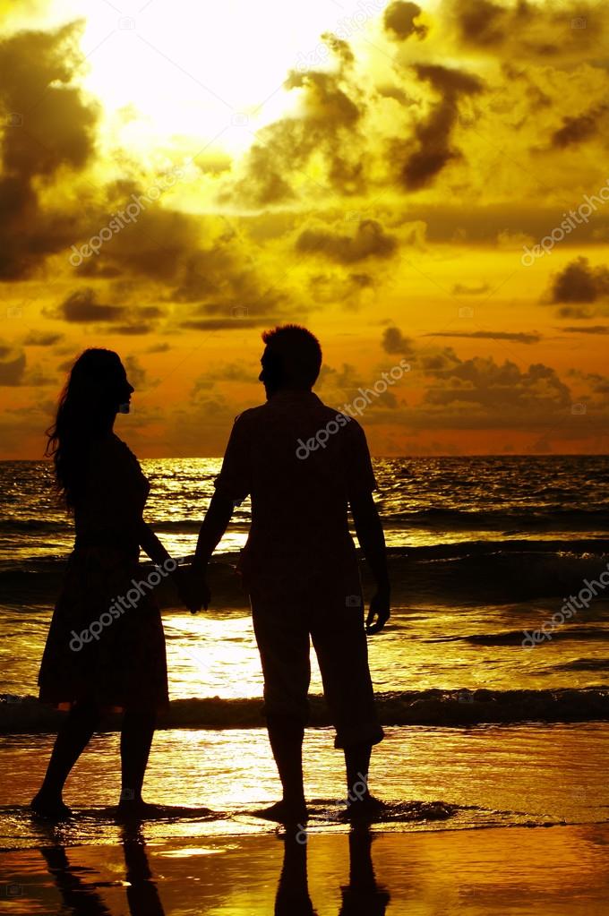 View Of Young Couple Canoodling Fondly During Sunset Stock Photo Image By C Ersler View Of Young Couple Canoodling Fondly During Sunset Stock Photo Image By C Ersler