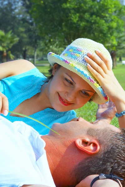 A portrait of attractive couple in summer environment — Stock Photo, Image