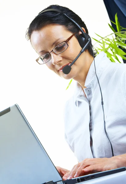 Nice operator in stylish glasses at her working place — Stock Photo, Image