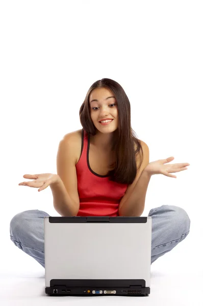 View of nice young girl sitting behind the laptop — Stock Photo, Image