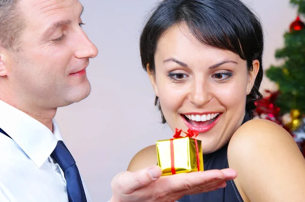 Portrait of young nice couple celebrating some occasion — Stock Photo, Image