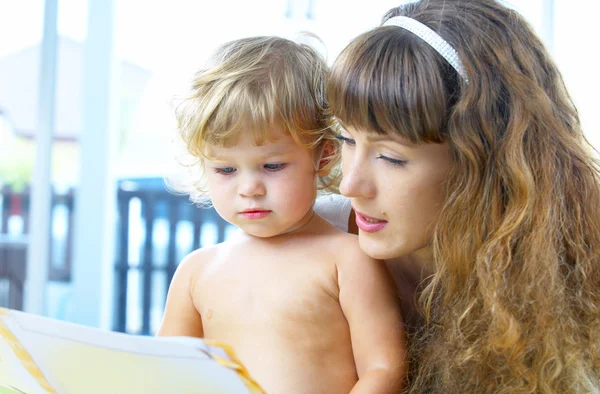 High key portrait of happy mother with baby — Stock Photo, Image