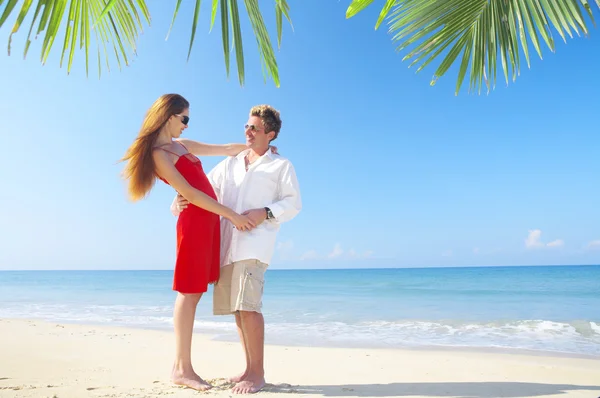 Portrait of attractive couple having date on the beach Stock Photo