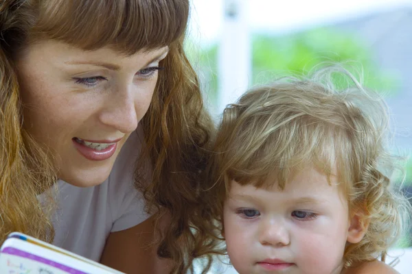 High key portrait of happy mother with baby — Stock Photo, Image