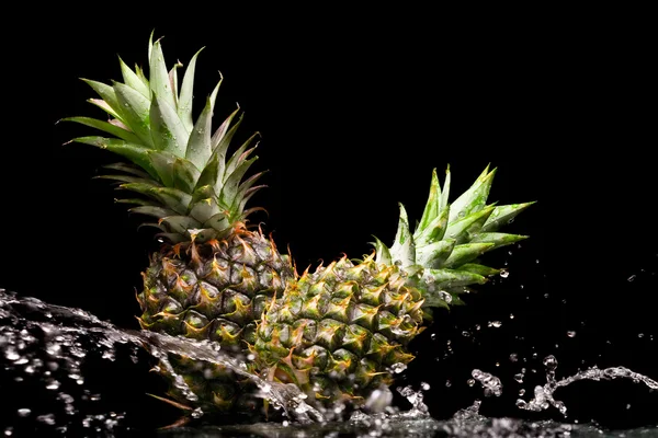 View of two nice fresh pineapples on black background — Stock Photo, Image