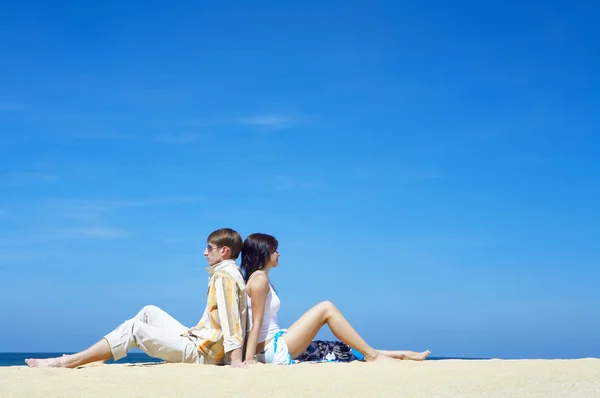 A portrait of attractive couple having date on the beach — Stock Photo, Image