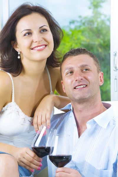 Portrait of young happy couple in domestic environment — Stock Photo, Image