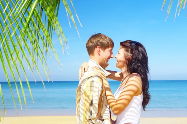 A portrait of attractive couple having date on the beach — Stock Photo, Image