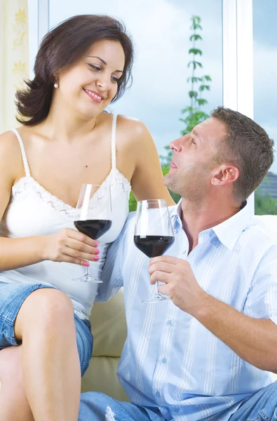 Portrait of young happy couple in domestic environment — Stock Photo, Image